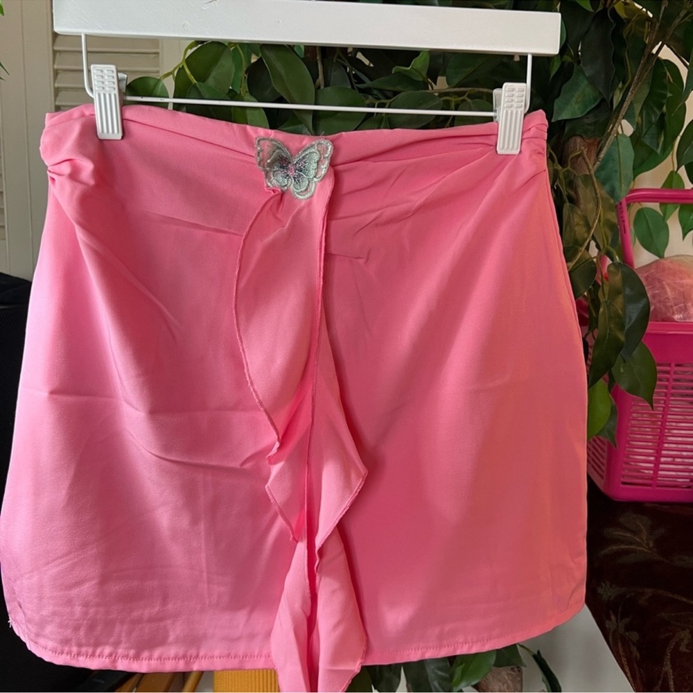 Vibrant Pink Mini Skirt with Curved Hem